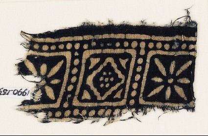 Textile fragment with squares, rosettes, and a diamond-shapefront