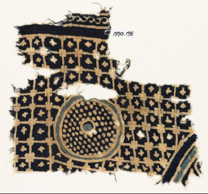 Textile fragment with grid, stars, and a circle with dotsfront