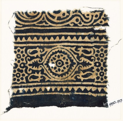 Textile fragment with medallion, and rosettes set into linked starsfront