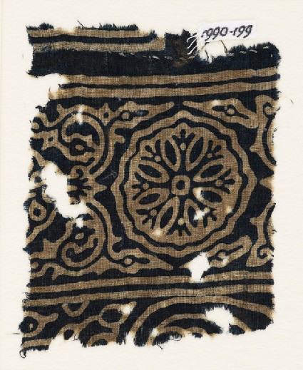 Textile fragment with ornate rosette, and tendrils with flower-headsfront