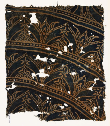 Textile fragment with arches and plantsfront