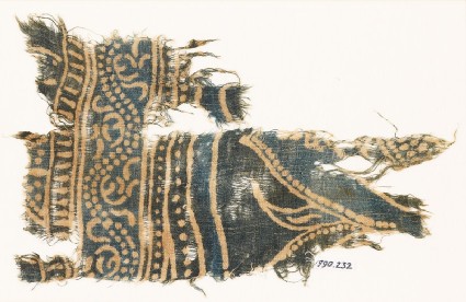 Textile fragment with dotted vine and part of a design of archesfront