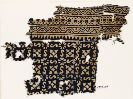 Textile fragment with S-shapes, rosettes, and quatrefoilsfront