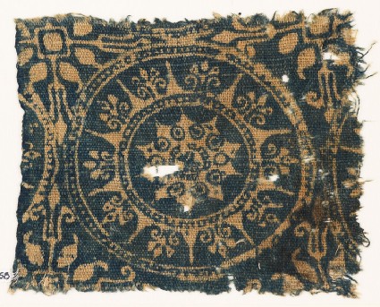 Textile fragment with medallion and starsfront