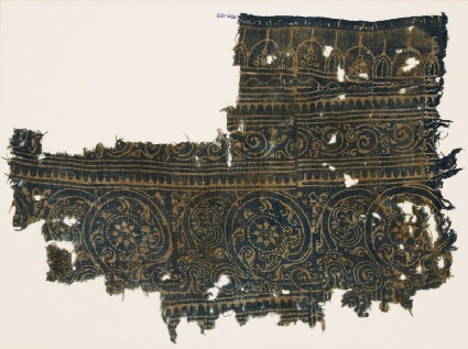 Textile fragment with linked scrollsfront