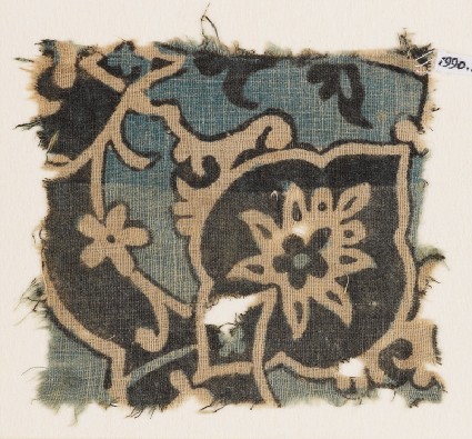 Textile fragment with large flower, tendrils, and leavesfront