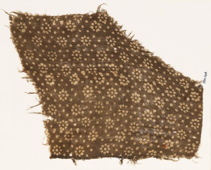 Textile fragment with rosettes and dotsfront