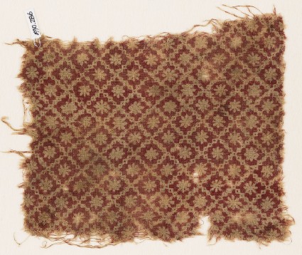 Textile fragment with stepped squares and rosettesfront