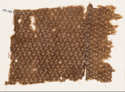 Textile fragment with linked chevrons and trefoilsfront