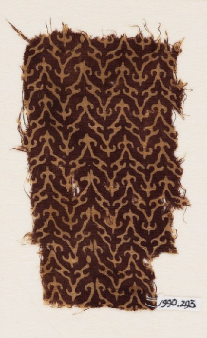 Textile fragment with linked chevrons and trefoilsfront