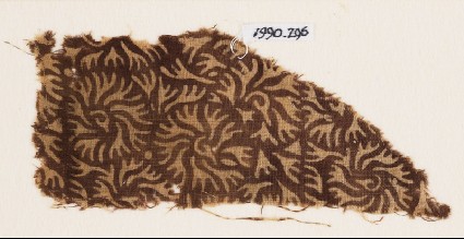 Textile fragment with swirling leavesfront