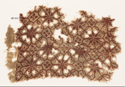 Textile fragment with interlocking floral shapesfront