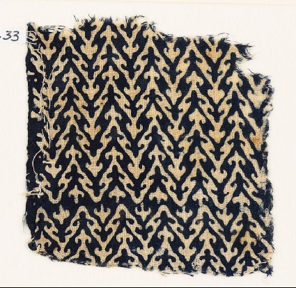Textile fragment with linked chevrons and trefoilsfront