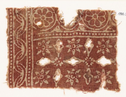 Textile fragment with rosettes and crossesfront