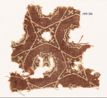Textile fragment with four-pointed stars and rosettesfront