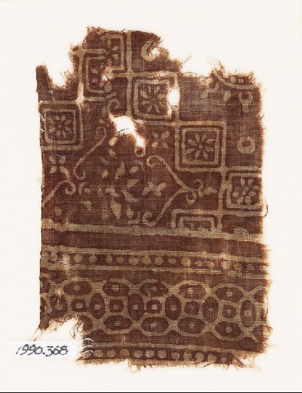Textile fragment with squares, rosettes, and interlocking quatrefoilsfront