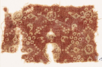 Textile fragment with rosettes and dotsfront