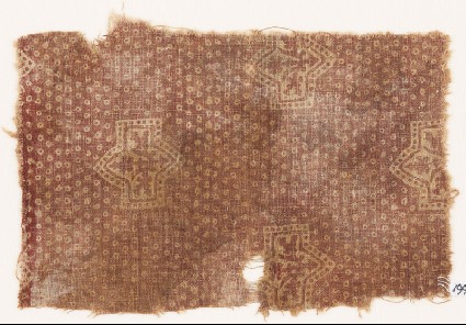Textile fragment with large plants and possibly bandhani, or tie-dye, imitationfront