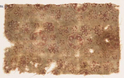 Textile fragment with large and small rosettesfront