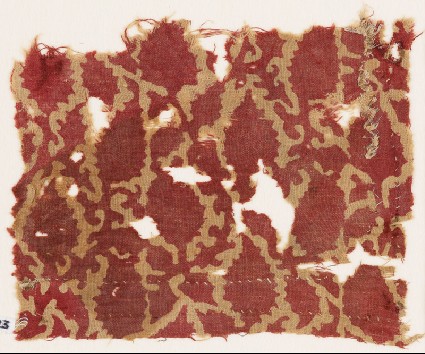 Textile fragment with tendrils and leavesfront