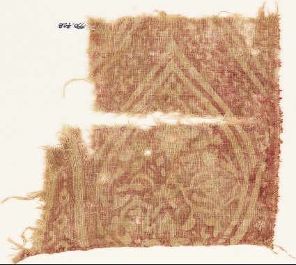 Textile fragment with an oval medallion, tendrils, and leavesfront