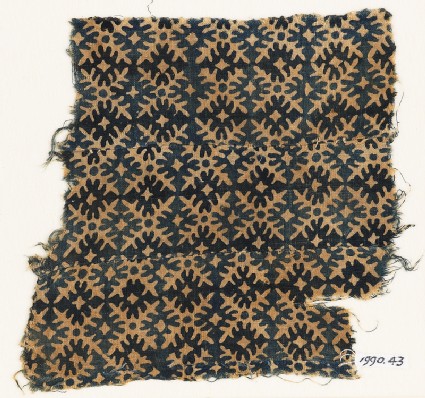 Textile fragment with serrated crossesfront