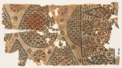 Textile fragment with tear-drops filled with scales, and stylized trees and flowersfront