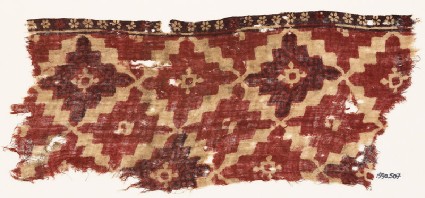 Textile fragment with diamond-shapes and lobed squaresfront