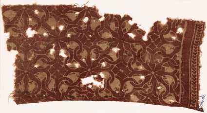 Textile fragment with interlocking spirals or rosettesfront