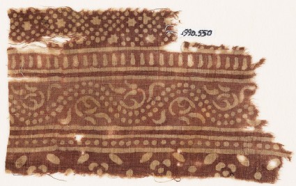 Textile fragment with bands of dotted vine, small stars and dots, and flowersfront