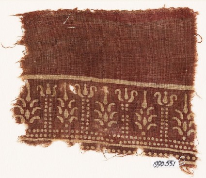 Textile fragment with columns and stylized treesfront