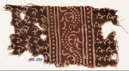 Textile fragment with stylized tendrils or hooks, and a dotted vinefront