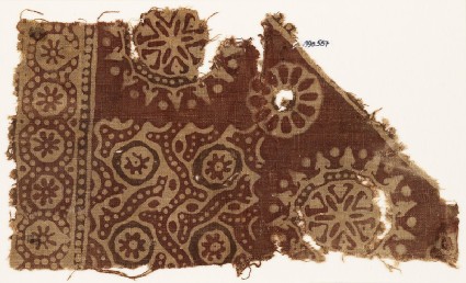 Textile fragment with rosettes in dotted circles, flower-heads, and dotted tendrilsfront