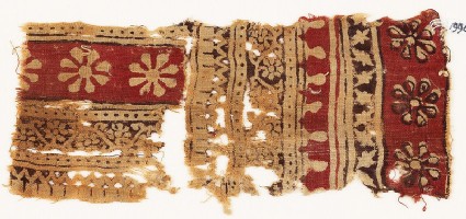 Textile fragment with bands of rosettes and vinesfront