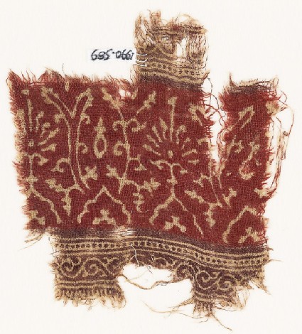 Textile fragment with stylized plants and vinesfront