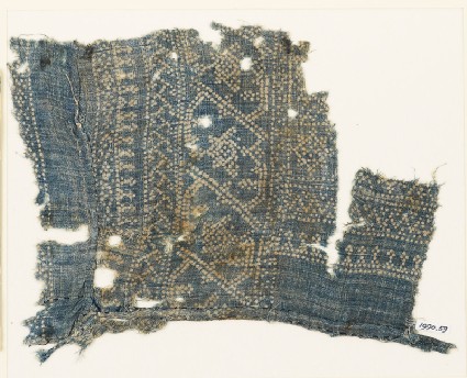 Textile fragment with dots, Z-shapes, and starsfront