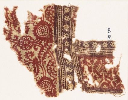 Textile fragment with elaborate flowers, tendrils, rosettes, and stylized plantsfront