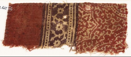 Textile fragment with tendrils, dotted frames, and rosettesfront
