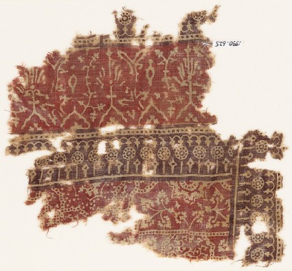Textile fragment with plants, half-medallions, and dotted circlesfront