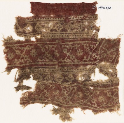 Textile fragment with bands of crossed tendrils, rosettes, and linked squaresfront