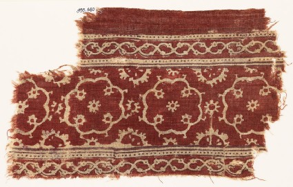 Textile fragment with medallions, rosettes, and vinesfront