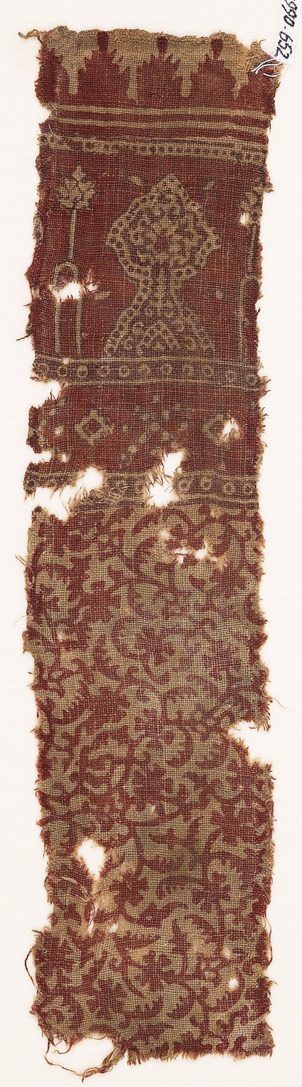 Textile fragment with tendrils, leaves, flower-heads, and floral designsfront