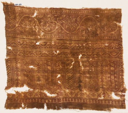 Textile fragment with arches, diamond-shapes, vines, and flowersfront