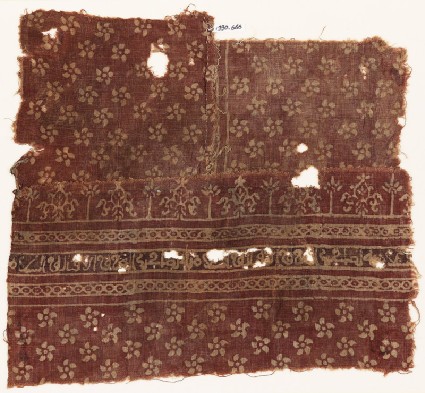 Textile fragment with flowers, cable pattern, stylized plants, and Arabic inscriptionfront