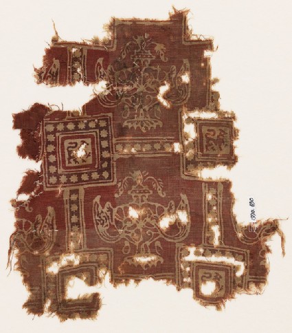 Textile fragment with squares, griffins or dragons, and urnsfront