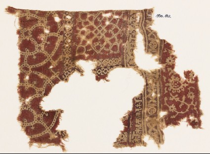 Textile fragment with interlocking circles, interlaced tendrils, and flower-headsfront