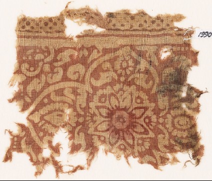 Textile fragment with medallion, flowers, and leavesfront