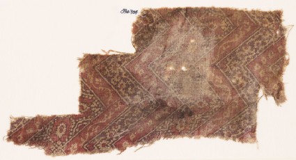 Textile fragment with chevrons, hexagons, and flowersfront