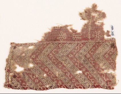 Textile fragment with chevrons, flowers, and snowflakesfront