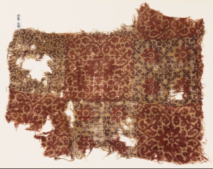 Textile fragment with quatrefoils, linked crosses, and rosettesfront